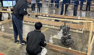 Students make sure their robots stays on track during the robotics competition at the 2025 Skills Ontario Competition.