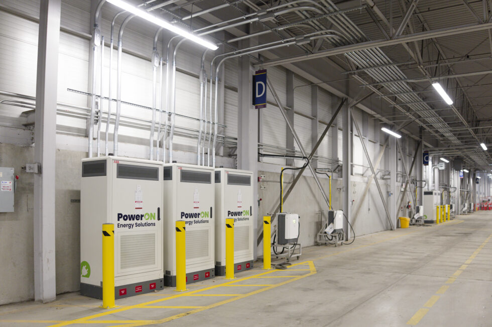 A row of electric chargers for transit.