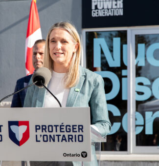 Kim Lauritsen, OPG's SVP Enterprise Strategy & Growth speaks at the opening of the Nuclear Discovery Centre in Port Hope, ON