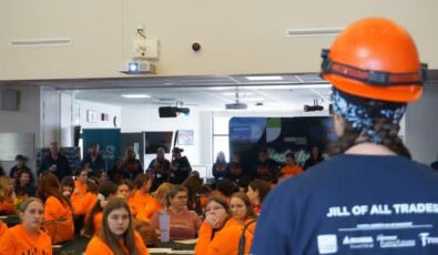 Heather Ferguson speaks with students during a "Jill of all Trades" event promoting skilled trades to young women.