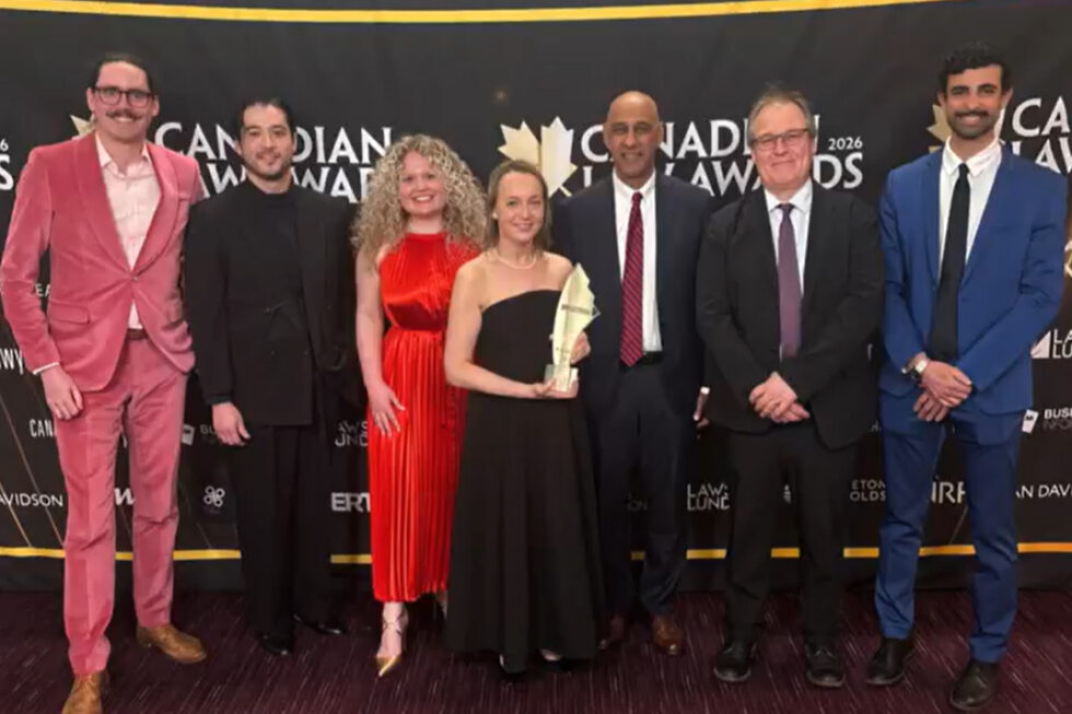 OPG's Law Team accepts the Singleton Urquhart Reynolds Vogel LLP Award for Construction, Infrastructure and Transportation Law Department of the Year