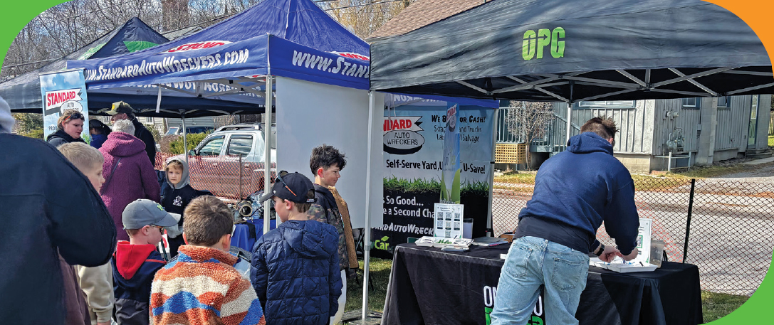 Community information booth at Float Your Fanny in Port Hope